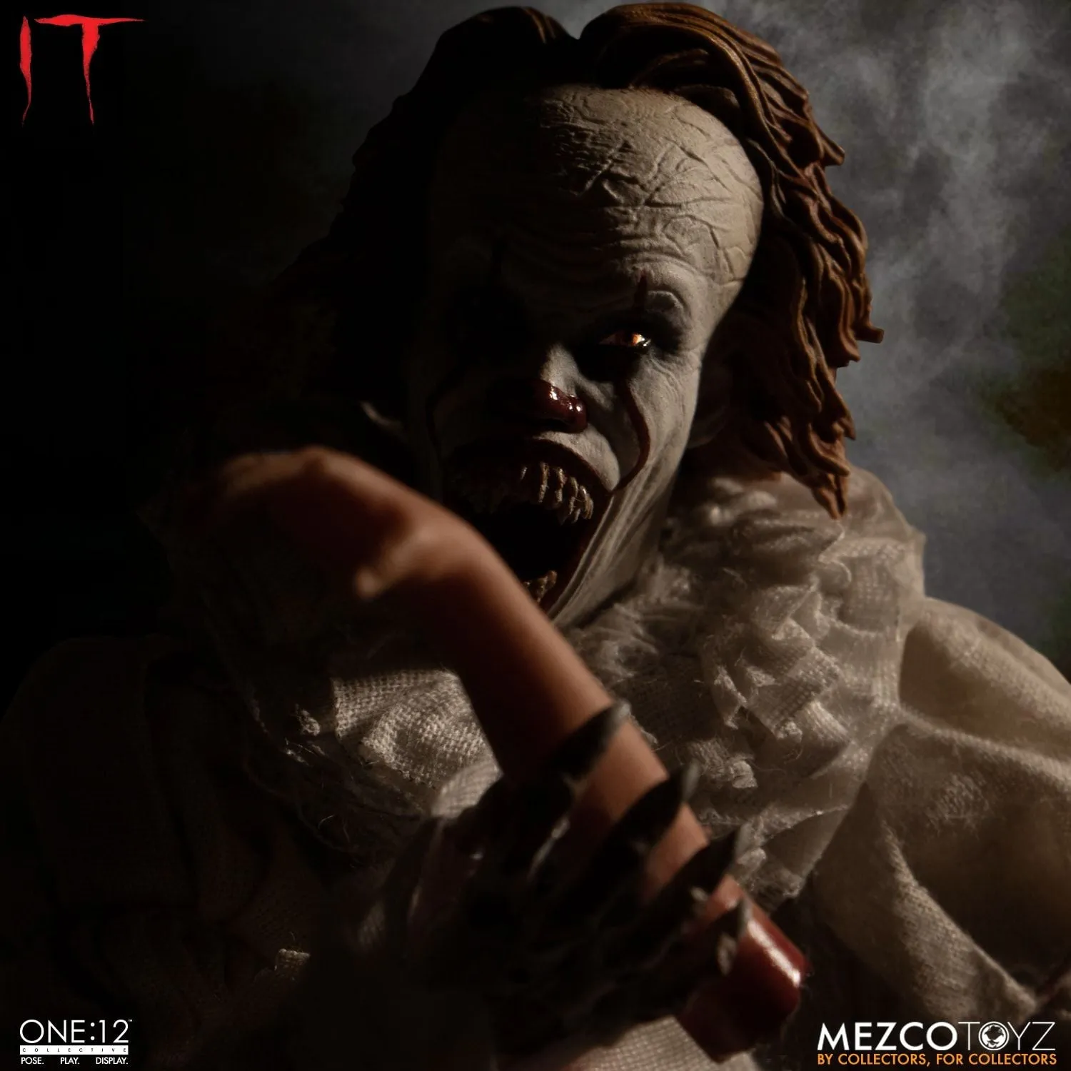 Mezco Toyz ONE:12 Collective: IT: Pennywise Action Figure